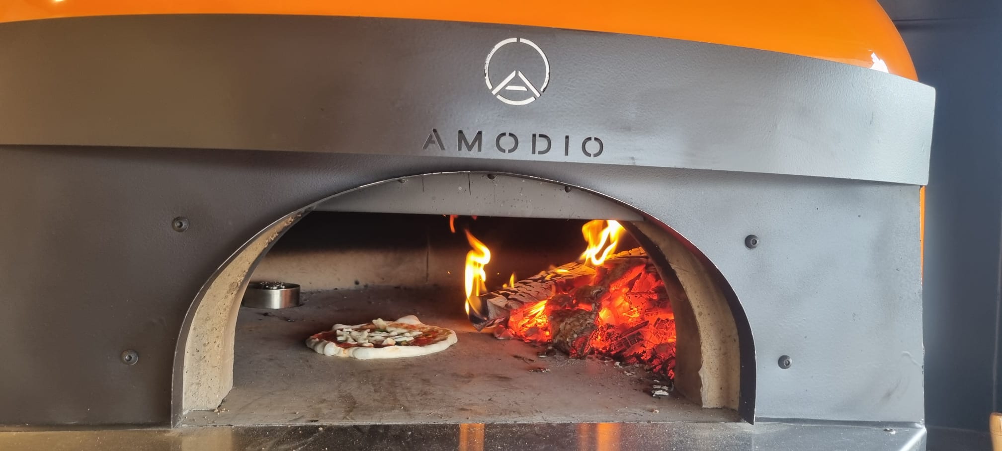 Live fire, 90 seconds a pizza